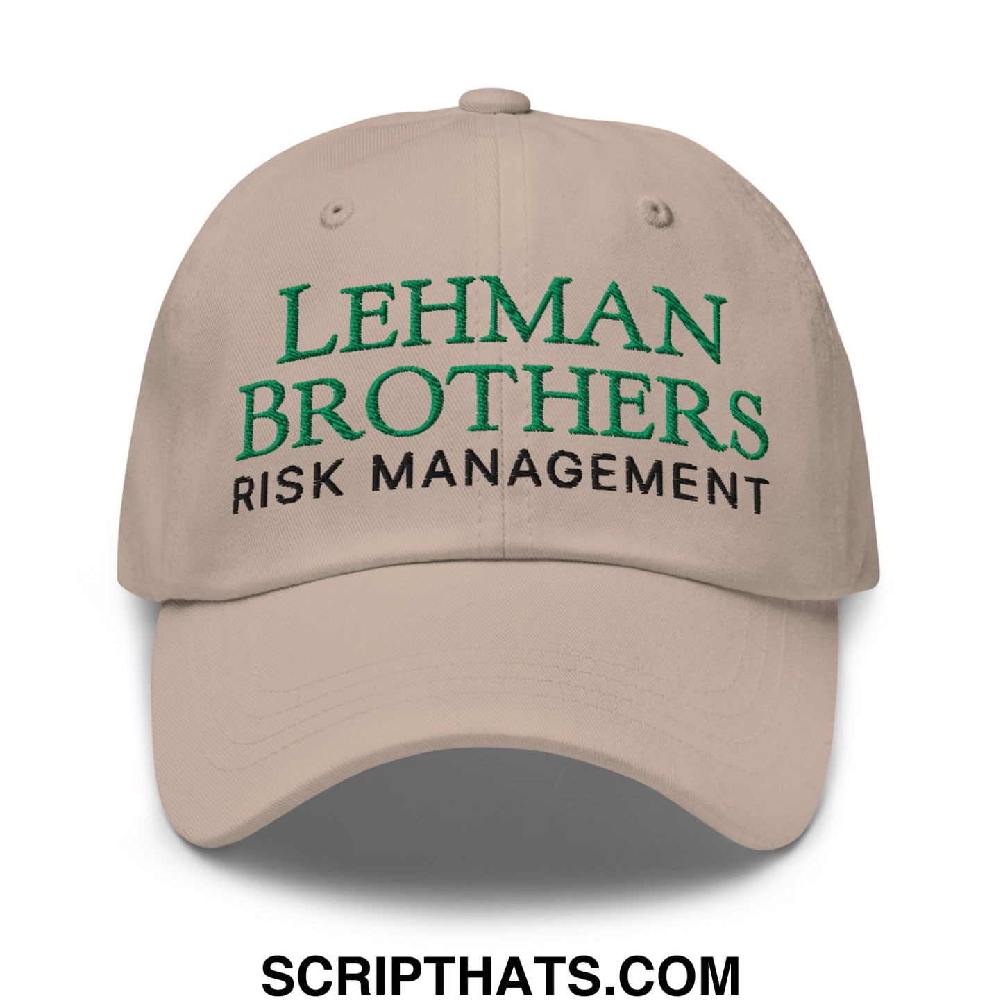 Beige unstructured dad hat with embroidered green and black lehman brothers risk management text