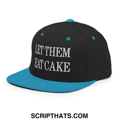Black and teal snapback hat with white embroidered let them eat cake text and flat bill brim design