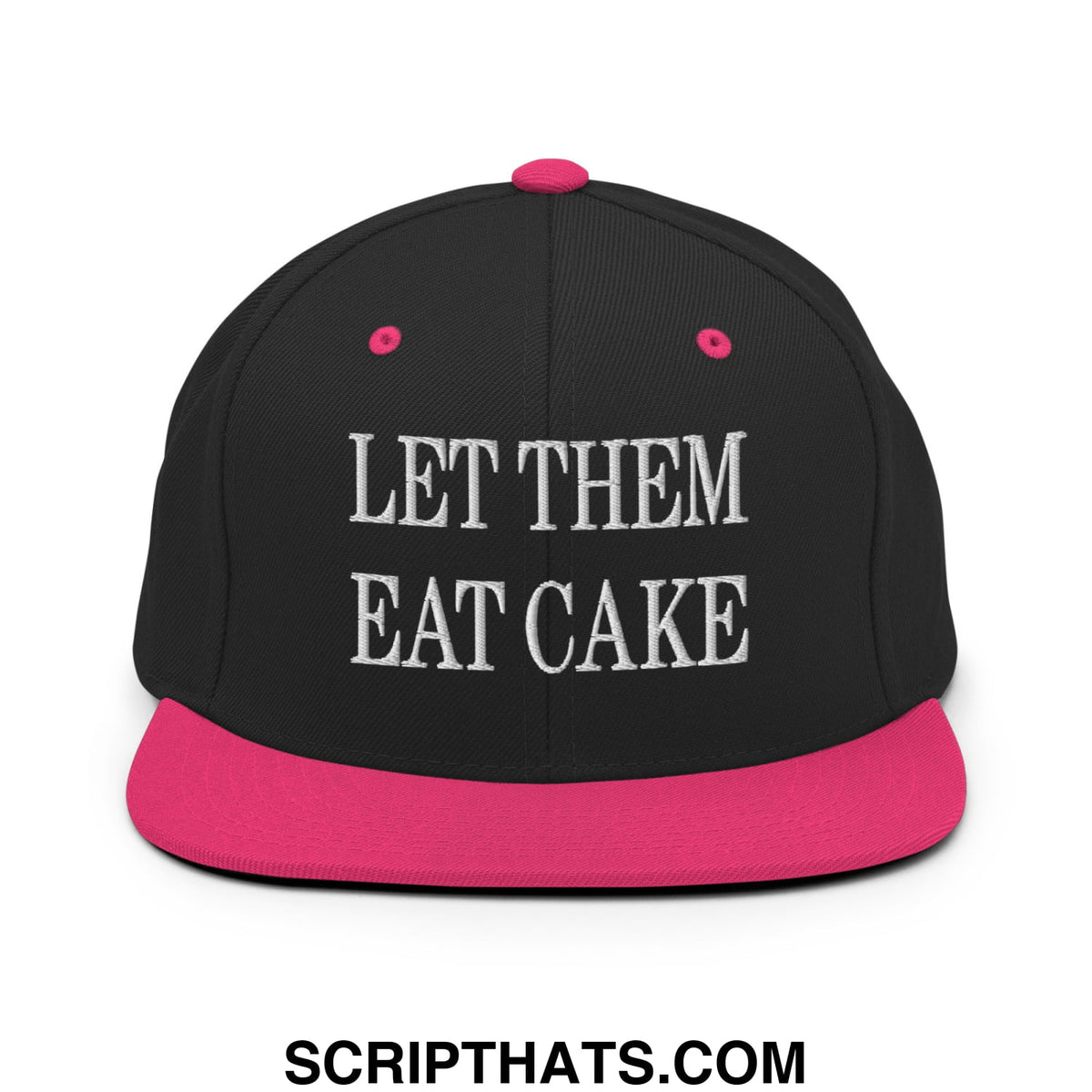 Black snapback cap with pink brim and white embroidered let them eat cake text on front panel