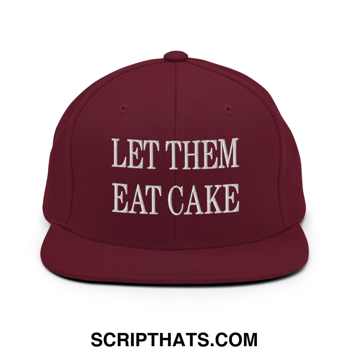 Maroon snapback hat with white embroidered let them eat cake text and flat bill brim design