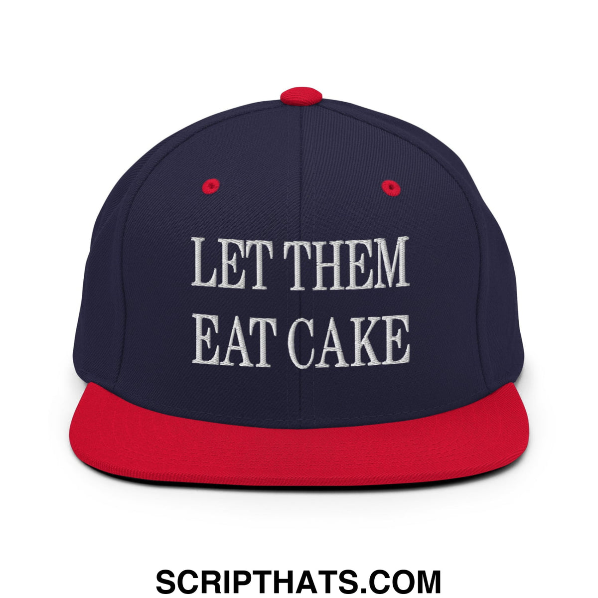 Navy blue and red snapback hat with flat bill and white embroidered let them eat cake text on front