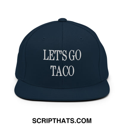 Navy blue snapback hat with white embroidered lets go taco text and flat bill brim for casual wear
