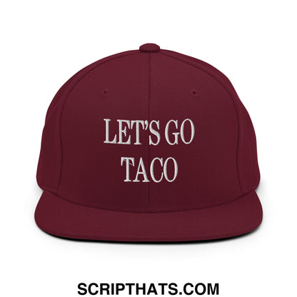 Maroon snapback hat with white embroidered lets go taco text flat bill brim for casual wear and sun protection