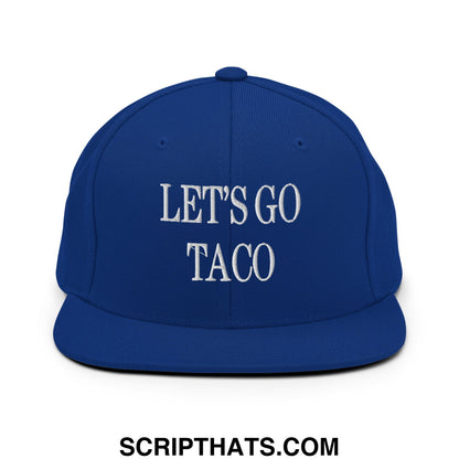 Royal blue snapback hat with white embroidered lets go taco text and flat bill brim for casual wear