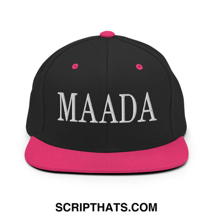 Black snapback cap with vibrant pink brim and button featuring maada embroidered in bold white letters front