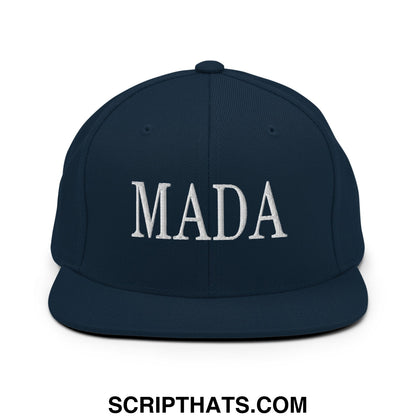 Navy blue snapback cap with white embroidered mada lettering and flat bill brim for casual wear