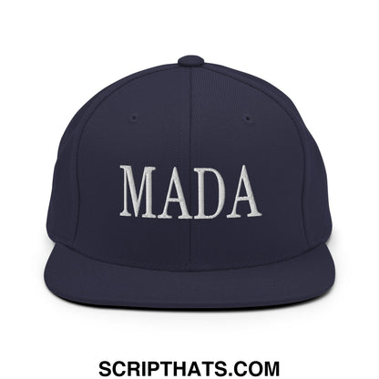 Navy blue snapback cap with white embroidered mada lettering featuring a flat bill brim for casual wear