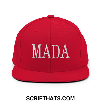 Red snapback cap with white embroidered mada lettering and flat bill brim for casual wear