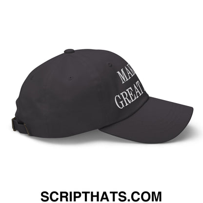 Black unstructured dad hat with white embroidered make america great again text on front panel