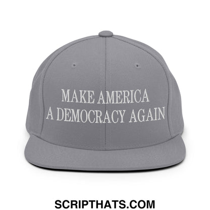 Gray snapback hat with white embroidered make america a democracy again text on flat bill brim