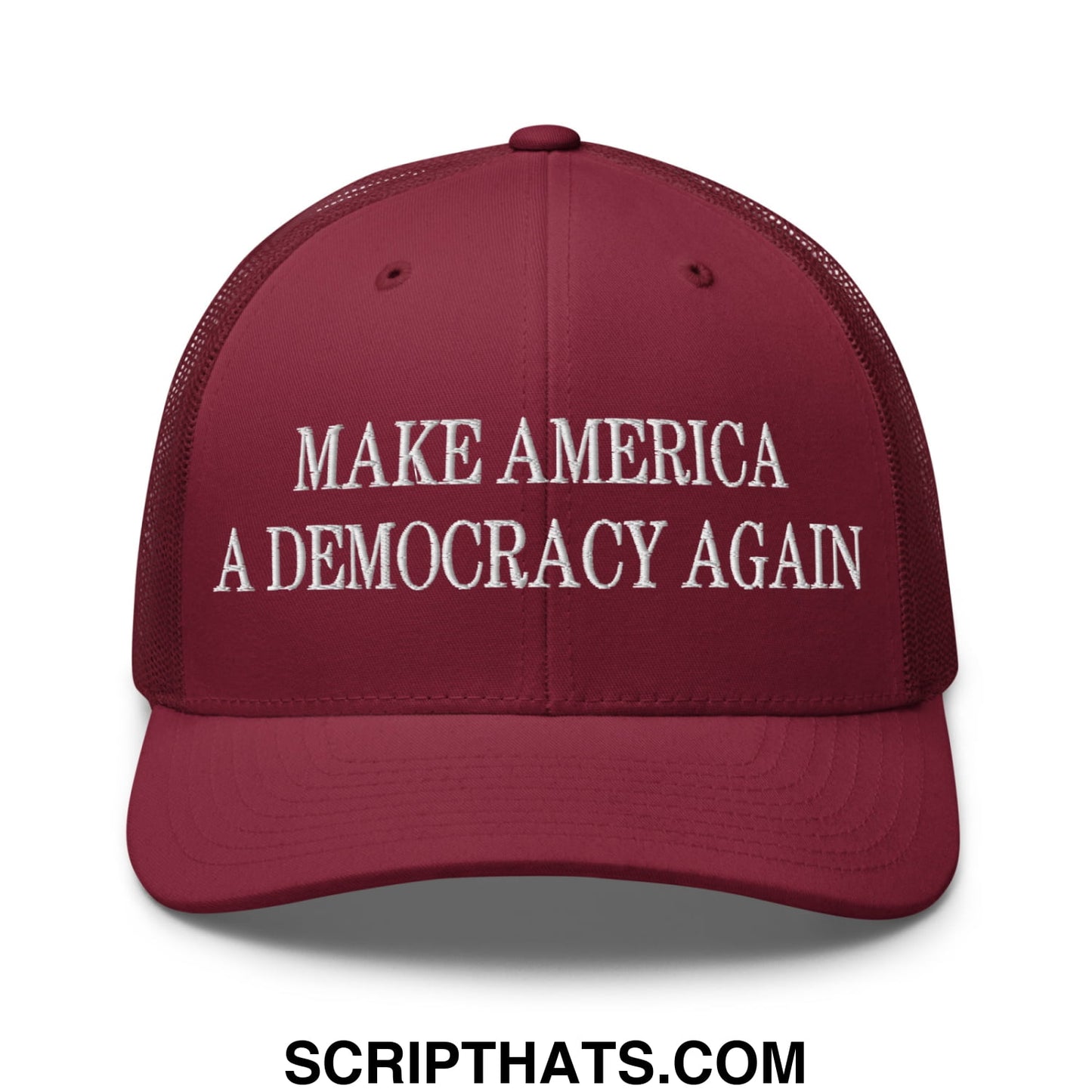 Maroon mesh trucker hat with white embroidered text make america a democracy again across the front panel