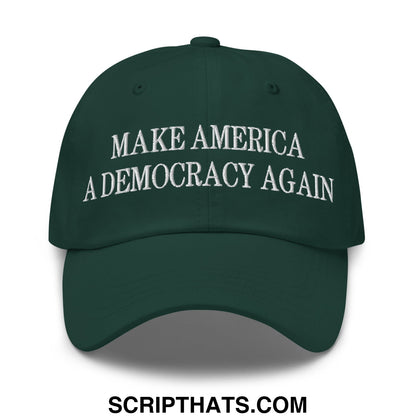 Dark green unstructured dad hat with white embroidered make america a democracy again text in embroidery style