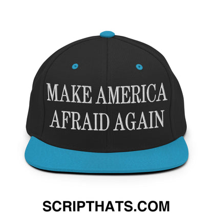 Black snapback cap with teal brim and button featuring white embroidered make america afraid again text