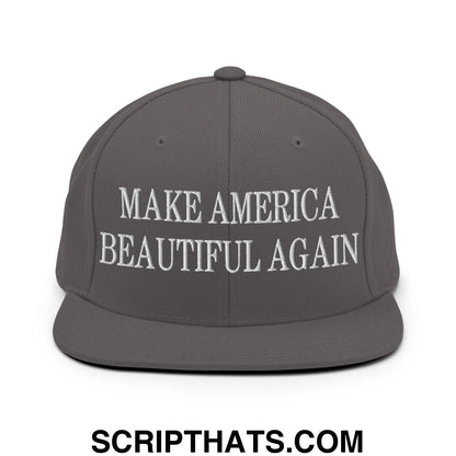 Gray snapback hat with flat bill brim featuring white embroidered make America beautiful again text