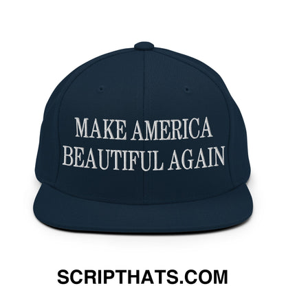 Navy blue snapback hat with white embroidered make america beautiful again text and flat bill brim design
