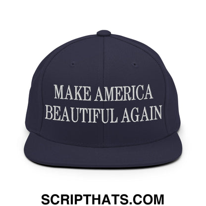 Navy blue snapback cap with white embroidered make america beautiful again text and flat bill brim design