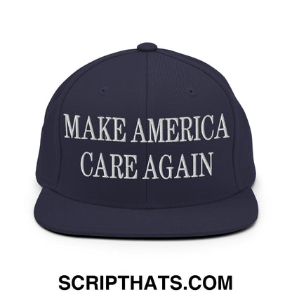 Navy blue snapback hat with white embroidered make america care again text and flat bill brim design