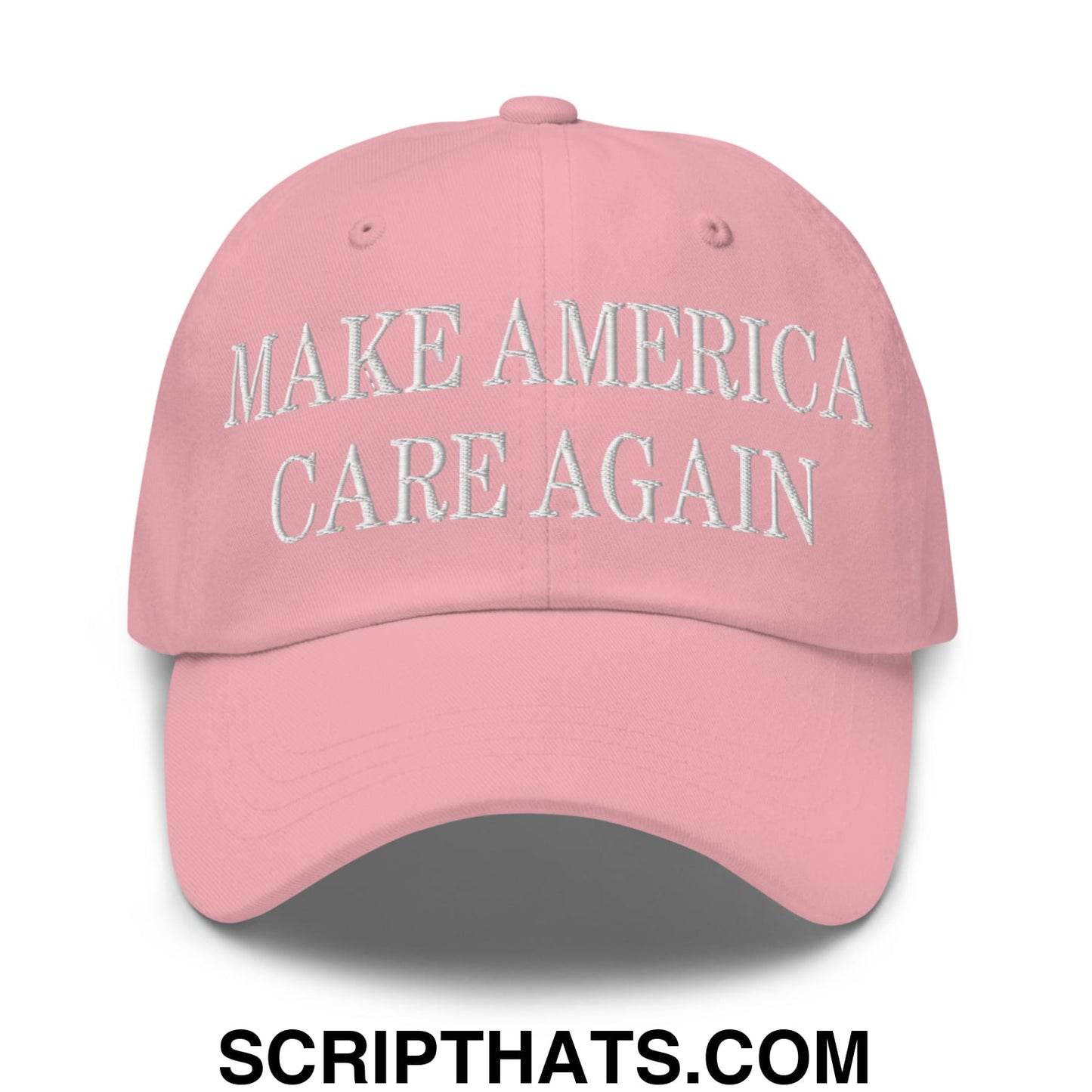 A soft pink embroidered unstructured dad hat with make america care again stitching on the front panel
