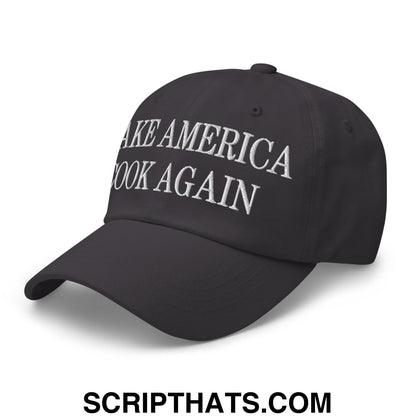 Black unstructured dad hat with white embroidered make america great again text on front for casual wear