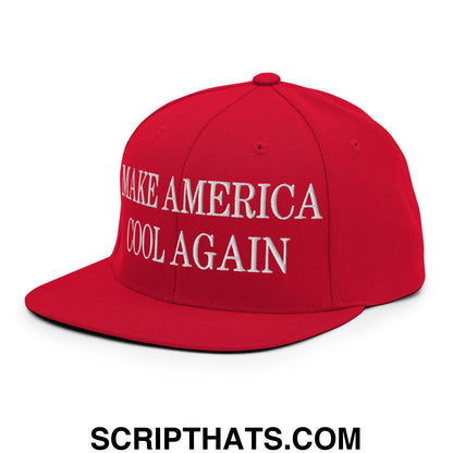 Red snapback cap with white embroidered make america cool again text and flat bill brim in a casual style