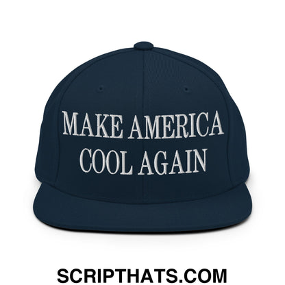 Navy blue snapback hat with white embroidered make america cool again text and flat bill brim design