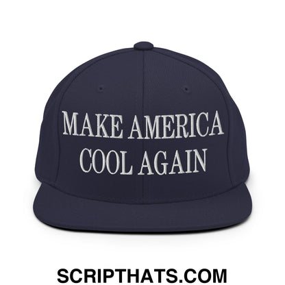 Navy blue snapback hat with white embroidered make america cool again text and flat bill brim design