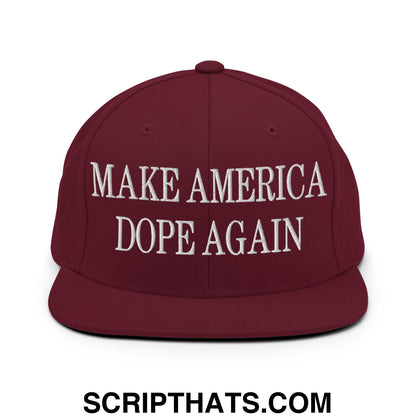 Maroon flat bill brim snapback hat with white embroidered make america dope again text in a streetwear style