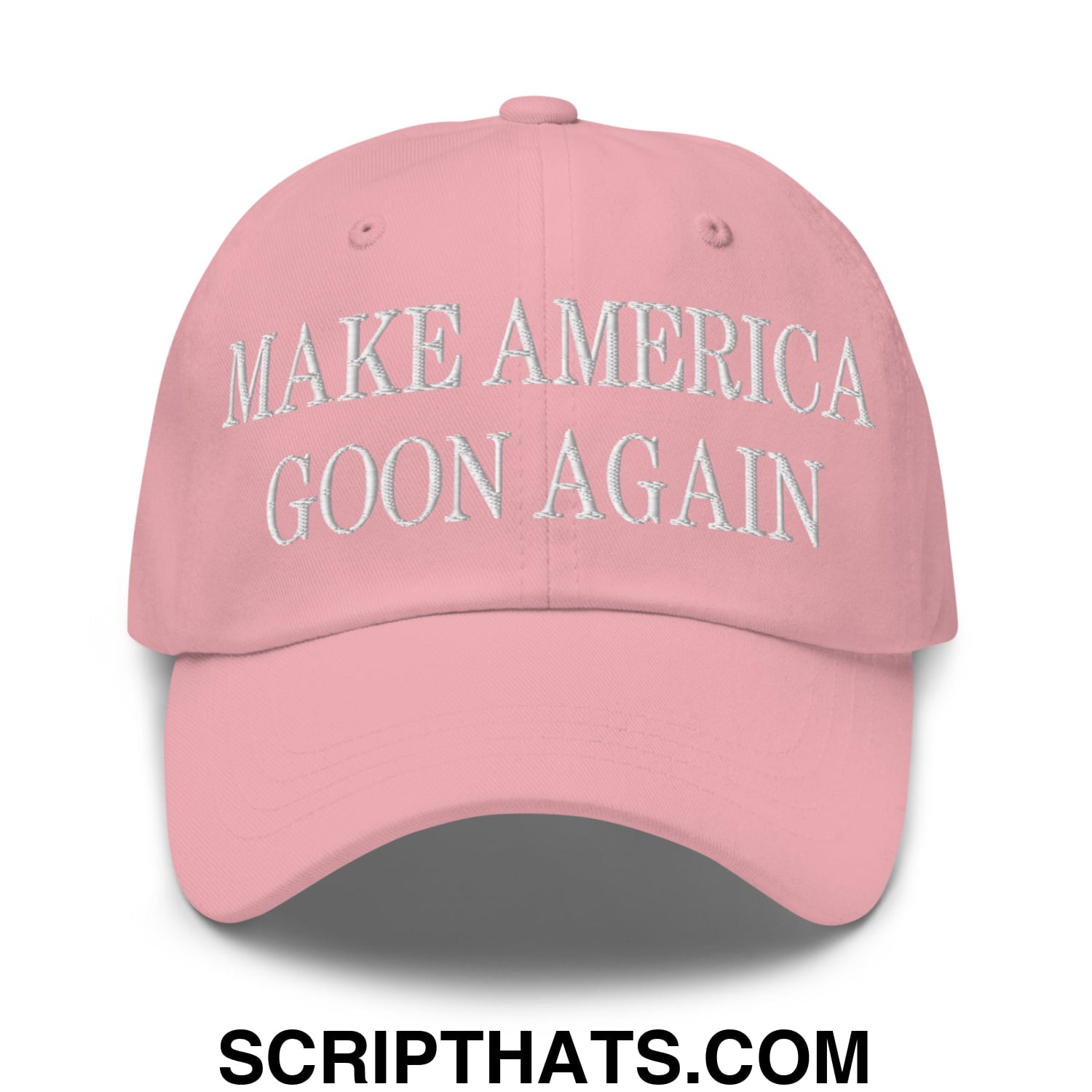 A pink unstructured dad hat with white embroidered text make america goon again and adjustable fit
