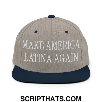 A gray and navy blue snapback hat with white embroidered text make america latina again and a flat bill brim