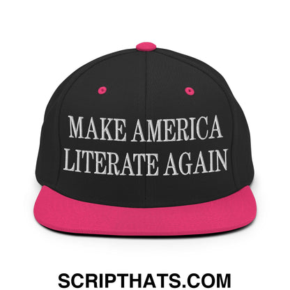 Black snapback hat with vibrant pink brim and button featuring white embroidered text make america literate again