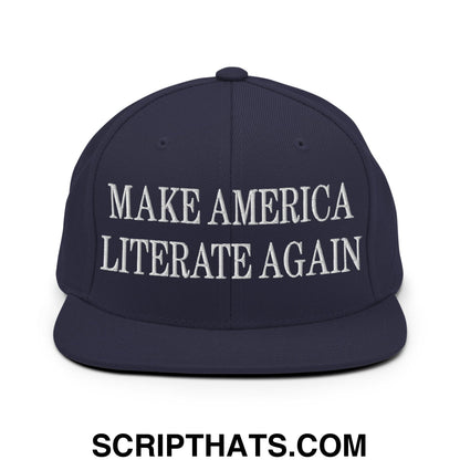 Navy blue snapback hat with white embroidered make america literate again text and flat bill brim design