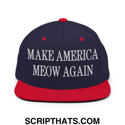 Navy blue and red snapback hat with white embroidered Make America Meow Again text flat bill brim design