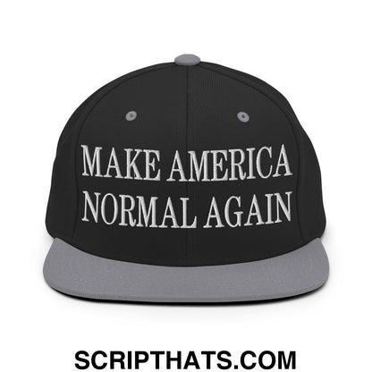 Black snapback hat with gray flat bill brim and white embroidered make america normal again text
