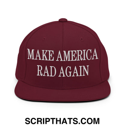 Maroon snapback cap with white embroidered make America rad again text featuring a flat bill brim design