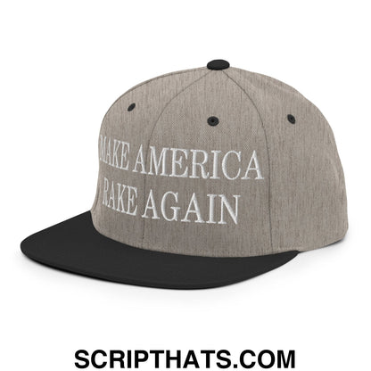 Gray and black snapback hat with white embroidered make america great again text and flat bill brim