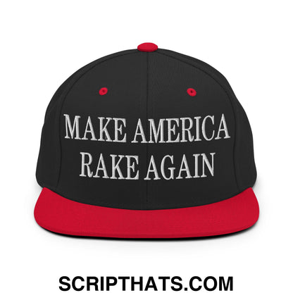 Black snapback cap with red brim and button featuring white embroidered make america rake again text