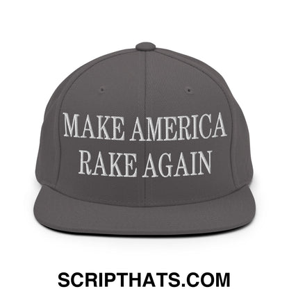 Gray snapback hat with white embroidered text make america rake again and a flat bill brim design