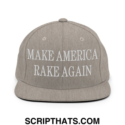Gray snapback hat with white embroidered make america rake again text and flat bill brim for casual wear
