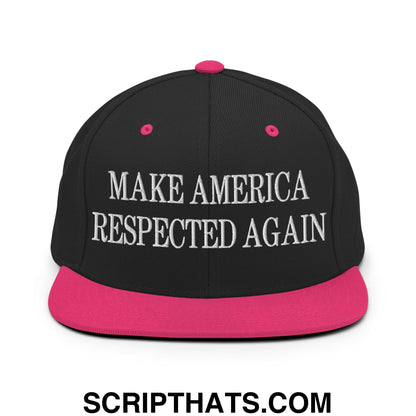 Black snapback cap with vibrant pink brim and white embroidered make america respected again text