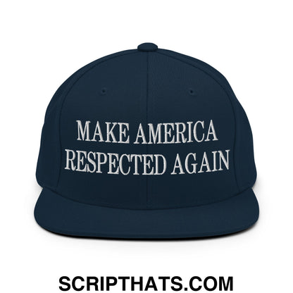 Navy blue snapback hat with white embroidered make america respected again text and flat bill brim design