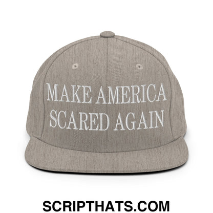 Gray snapback hat with flat bill brim featuring white embroidered text make america scared again
