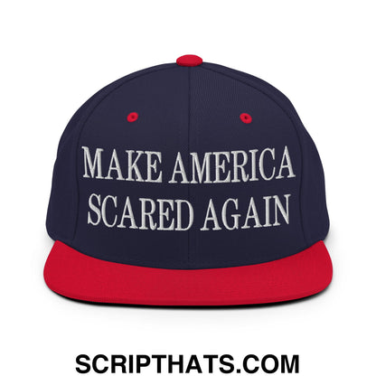 Navy blue and red snapback hat with white embroidered make america scared again text and flat bill brim design