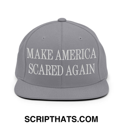 Gray snapback hat with white embroidered make America scared again text and a flat bill brim design