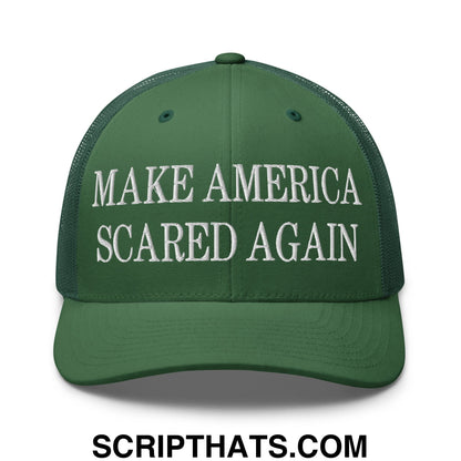 Green mesh trucker hat with white embroidered text reading make america scared again on front panel