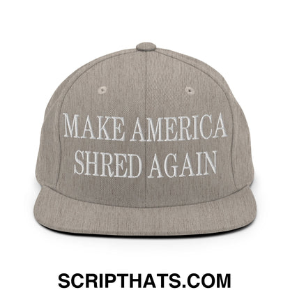 Gray flat bill brim snapback hat with white embroidered text reading make america shred again for casual wear