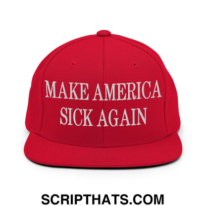 Red snapback hat with flat bill brim and white embroidered make america sick again text on front panel