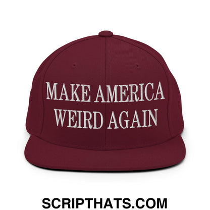 Maroon snapback hat with white embroidered make america weird again text and flat bill brim design