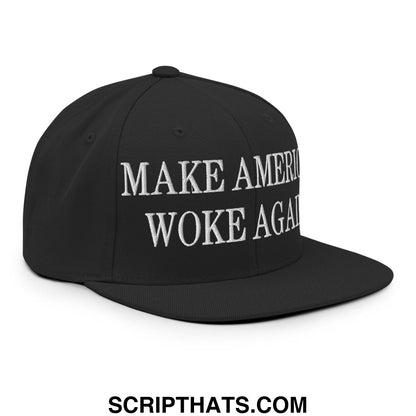 Black snapback hat with flat bill brim and white embroidered text make america woke again on front panel
