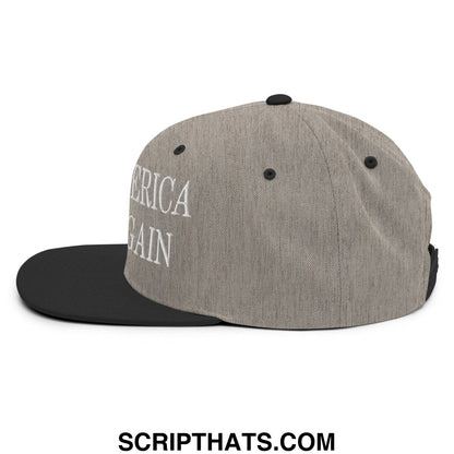 Gray heathered snapback cap with black brim and white embroidered america again text in a flat bill design