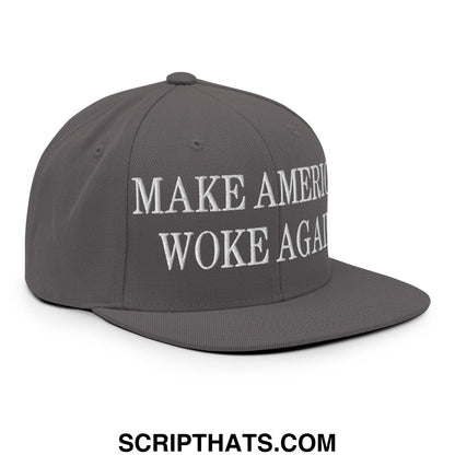 Gray snapback cap with white embroidered make america woke again text featuring a flat bill brim design